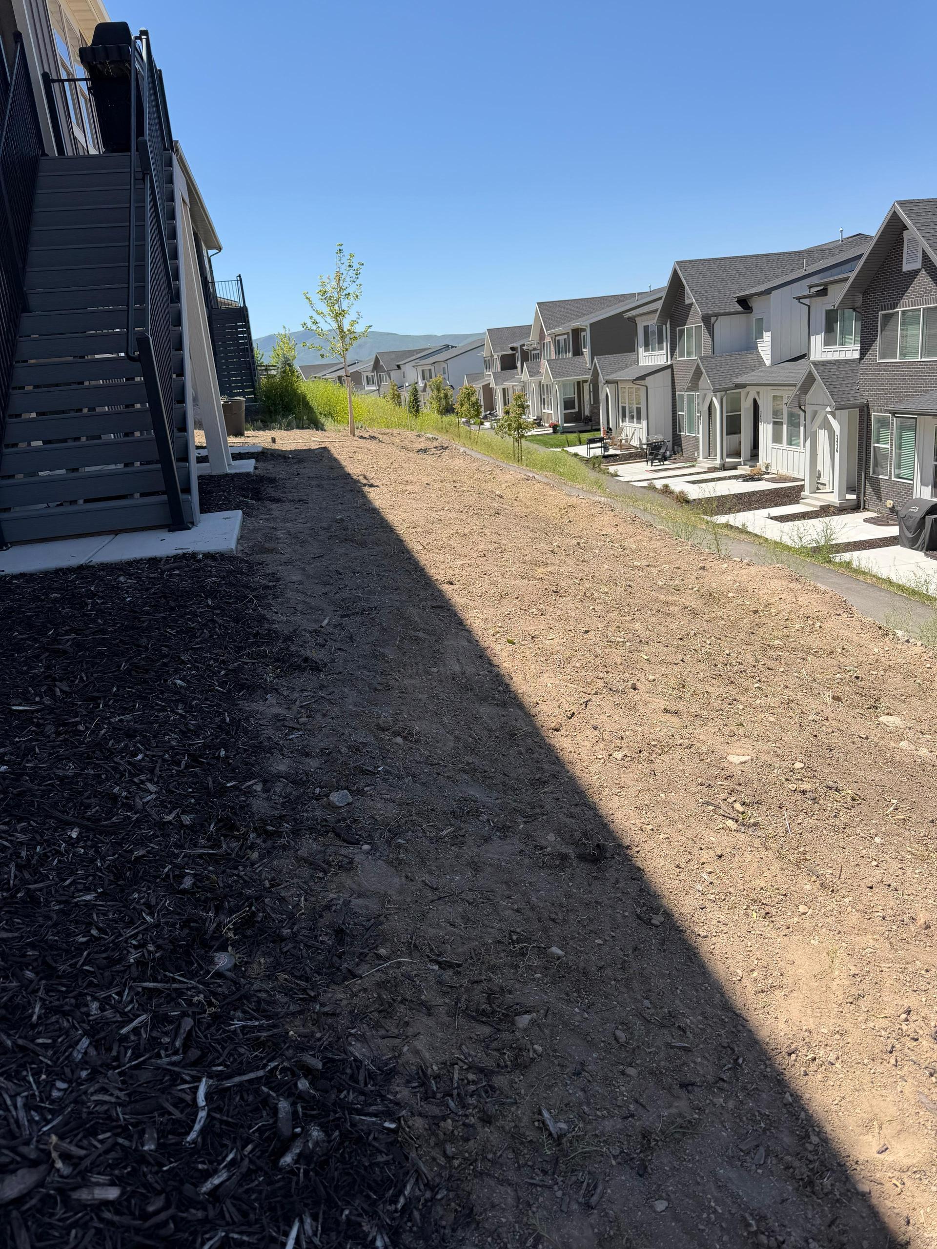 Fresh mulch and gravel installation